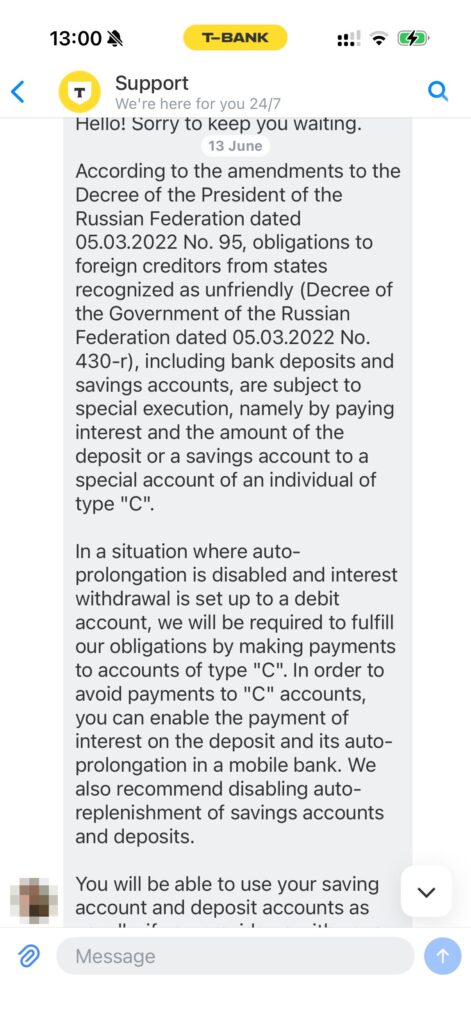 T-Bank support chat explaining the freezing of foreigners' deposits under Decree 377