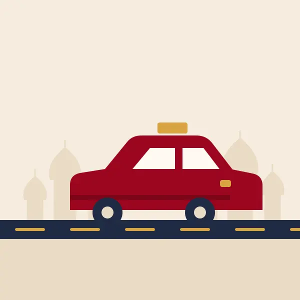 Red taxi on a road